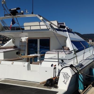 EUPHORIE 40 - JEANTOT - vue arriere à quai Empuriabrava